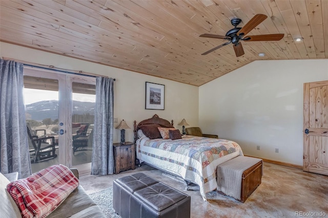 bedroom featuring wood ceiling, vaulted ceiling, a mountain view, ceiling fan, and access to exterior