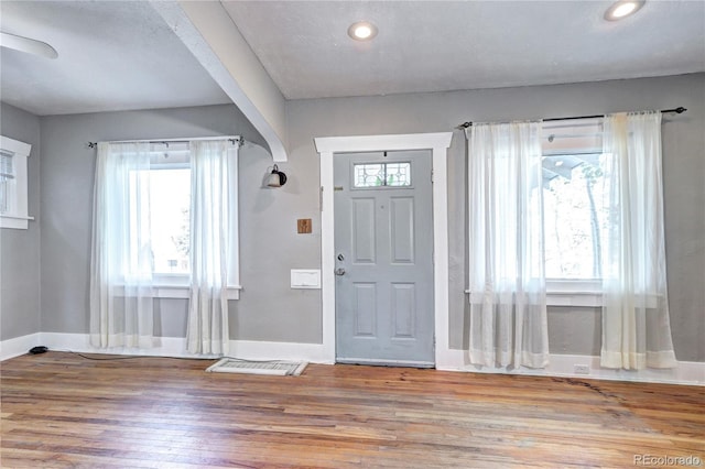 3336 N Saint Paul St, Denver, CO 80205 - entryway with baseboards, wood finished floors, and recessed lighting