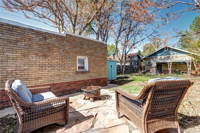 3336 N Saint Paul St, Denver, CO 80205 - view of patio / terrace with an outdoor fire pit and an outdoor structure