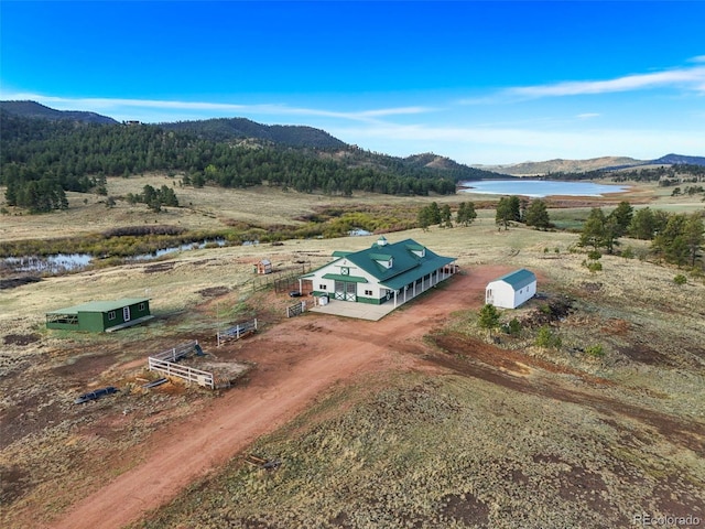 224 Lakeview Forest Hts, Florissant, CO 80816 - aerial view of property and surrounding area featuring a water and mountain view