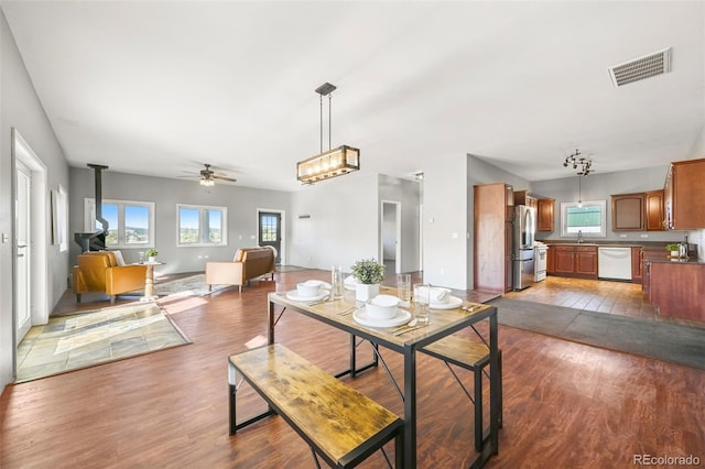 224 Lakeview Forest Hts, Florissant, CO 80816 - dining room with healthy amount of natural light, a ceiling fan, and wood finished floors