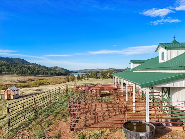 224 Lakeview Forest Hts, Florissant, CO 80816 - view of yard featuring a mountain view, a view of rural / pastoral area, and an exterior structure