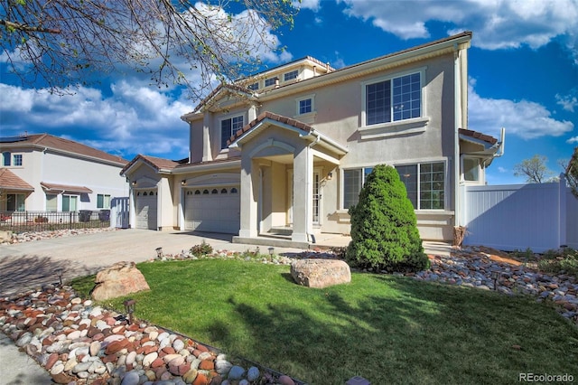 21229 E 50th Ave, Denver, CO 80249 - view of front facade featuring fence, stucco siding, concrete driveway, and a front yard