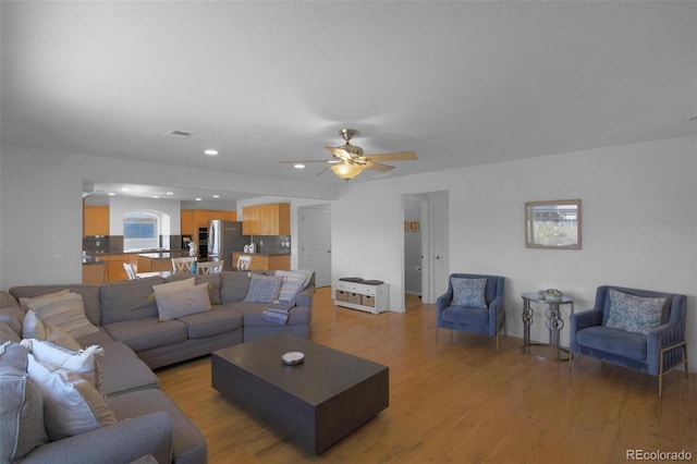 21229 E 50th Ave, Denver, CO 80249 - living room with ceiling fan, recessed lighting, visible vents, and light wood-style floors