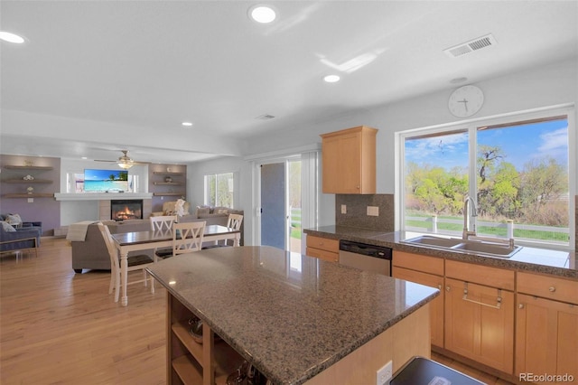 21229 E 50th Ave, Denver, CO 80249 - kitchen featuring a sink, visible vents, recessed lighting, light wood-style flooring, and stainless steel dishwasher