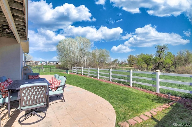21229 E 50th Ave, Denver, CO 80249 - view of patio / terrace with a fenced backyard and outdoor dining area