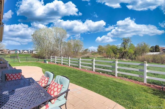 21229 E 50th Ave, Denver, CO 80249 - view of patio / terrace with fence and outdoor dining space
