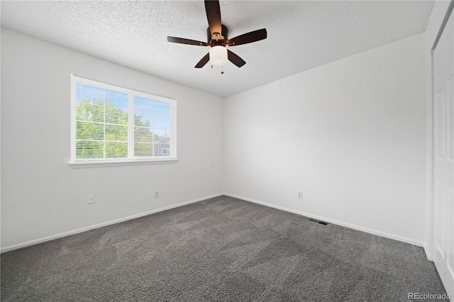 4064 S Himalaya Way, Aurora, CO 80013 - empty room with a textured ceiling, dark colored carpet, and ceiling fan