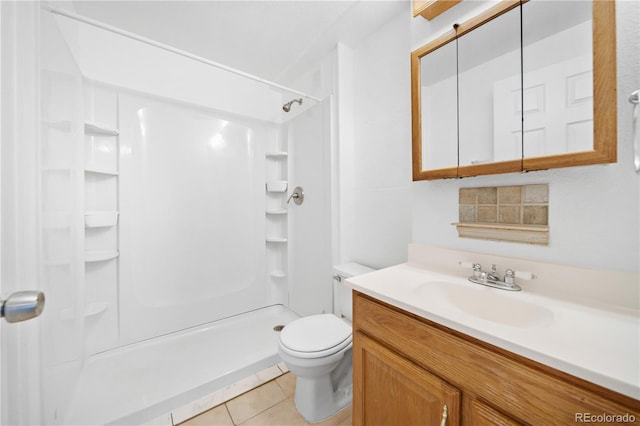 4064 S Himalaya Way, Aurora, CO 80013 - full bath featuring a shower, vanity, and tile patterned floors