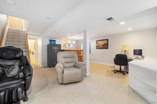 interior space featuring visible vents, light colored carpet, a dry bar, baseboards, and stairs