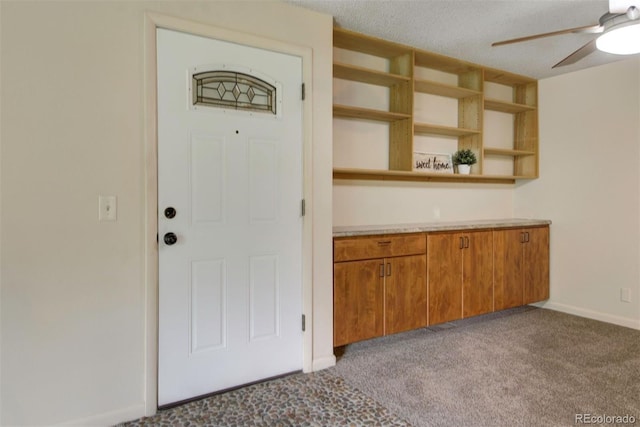 6505 Kalua Rd Unit 104B, Boulder, CO 80301 - view of exterior entry with ceiling fan