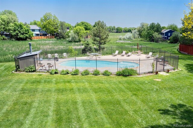 6505 Kalua Rd Unit 104B, Boulder, CO 80301 - community pool with a patio area and view of wooded area