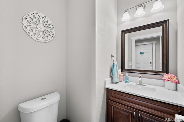 12214 Stone Timber Ct, Parker, CO 80134 - half bath featuring vanity and toilet