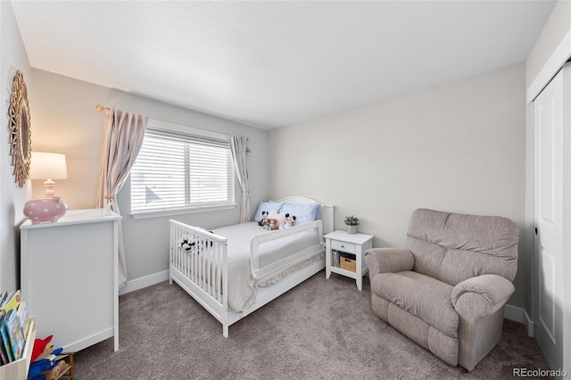 12214 Stone Timber Ct, Parker, CO 80134 - carpeted bedroom with baseboards and a closet