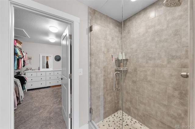 12214 Stone Timber Ct, Parker, CO 80134 - full bathroom with a stall shower, vanity, and a walk in closet