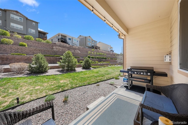12214 Stone Timber Ct, Parker, CO 80134 - fenced backyard featuring a residential view, a grill, and a patio area