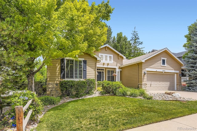 10050 Eagle Valley Way, Highlands Ranch, CO 80129 - view of front facade featuring a garage, a front yard, concrete driveway, and stone siding