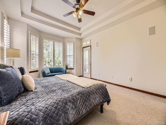 10050 Eagle Valley Way, Highlands Ranch, CO 80129 - bedroom with carpet, a raised ceiling, and ceiling fan