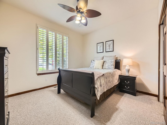 10050 Eagle Valley Way, Highlands Ranch, CO 80129 - bedroom featuring light colored carpet and ceiling fan