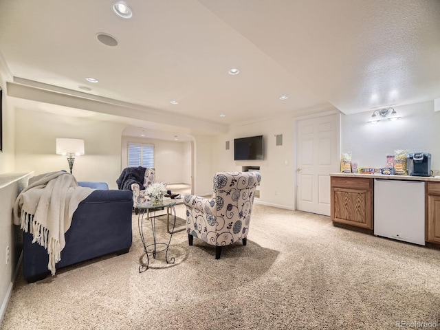 10050 Eagle Valley Way, Highlands Ranch, CO 80129 - living room with a dry bar, light carpet, and recessed lighting