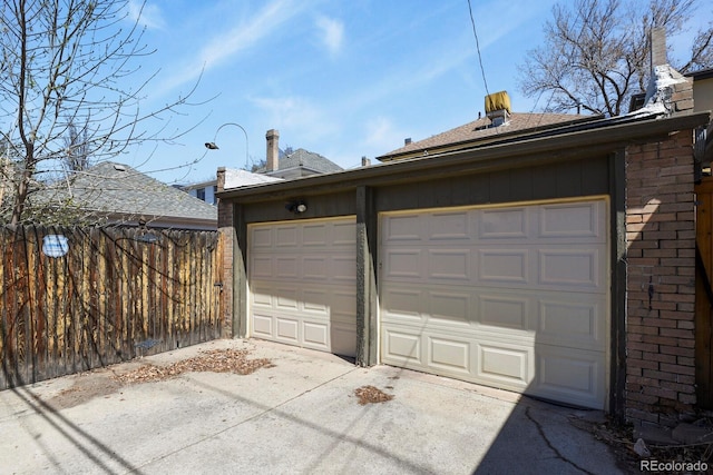 garage with fence