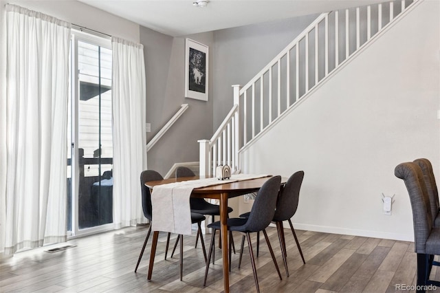 dining room featuring wood-type flooring