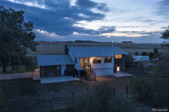 view of front of property with a patio