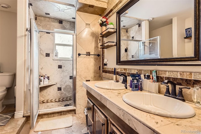 bathroom featuring walk in shower, vanity, backsplash, and toilet