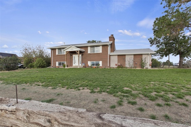 view of front facade with a front lawn