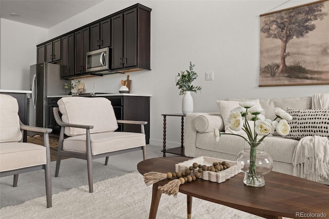 12547 Lake View St, Longmont, CO 80504 - living room featuring light colored carpet and baseboards