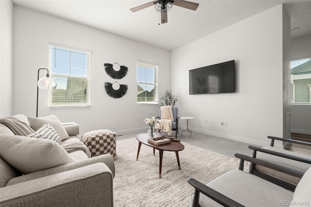 12547 Lake View St, Longmont, CO 80504 - living room with healthy amount of natural light, baseboards, carpet flooring, and ceiling fan