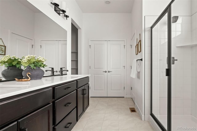 12547 Lake View St, Longmont, CO 80504 - full bath with a shower stall, double vanity, and tile patterned flooring