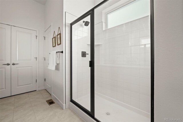 12547 Lake View St, Longmont, CO 80504 - full bath featuring a stall shower and tile patterned floors