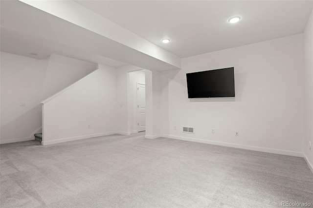 12547 Lake View St, Longmont, CO 80504 - below grade area featuring carpet, baseboards, stairway, and recessed lighting