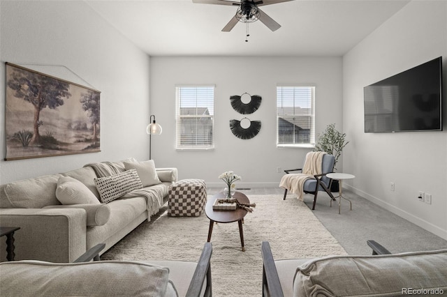 12547 Lake View St, Longmont, CO 80504 - living area with carpet flooring, ceiling fan, and baseboards