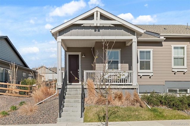 12547 Lake View St, Longmont, CO 80504 - view of front of house featuring covered porch and roof with shingles
