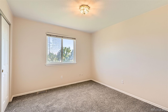 12701 Elm Ln, Broomfield, CO 80020 - carpeted spare room featuring baseboards