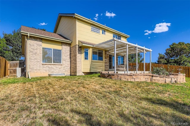 12701 Elm Ln, Broomfield, CO 80020 - back of house featuring a patio, a fenced backyard, brick siding, and a pergola