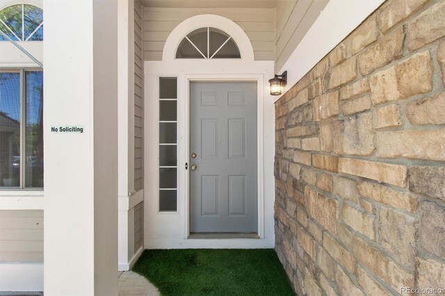 1462 Marigold Dr, Lafayette, CO 80026 - view of exterior entry featuring stone siding