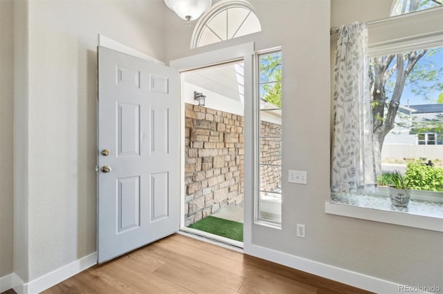 1462 Marigold Dr, Lafayette, CO 80026 - foyer with wood finished floors and baseboards