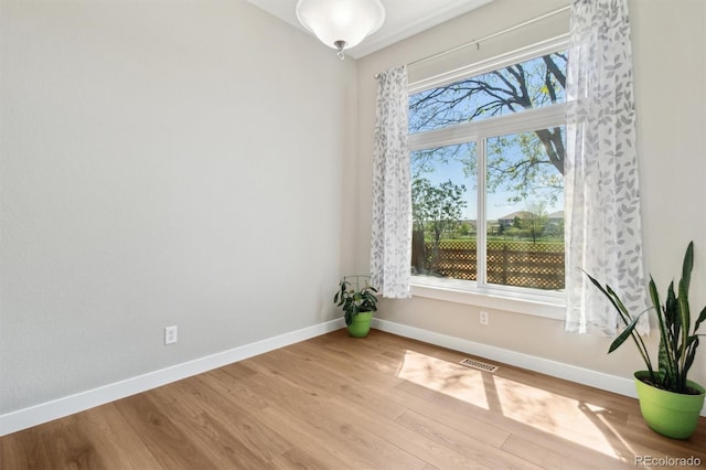1462 Marigold Dr, Lafayette, CO 80026 - spare room featuring baseboards and light wood-type flooring