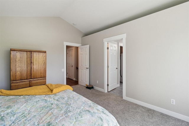 1462 Marigold Dr, Lafayette, CO 80026 - carpeted bedroom with baseboards, refrigerator, and high vaulted ceiling