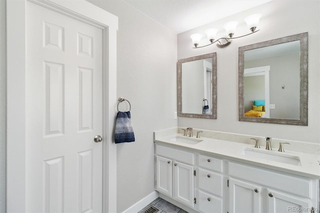1462 Marigold Dr, Lafayette, CO 80026 - full bathroom featuring double vanity and baseboards