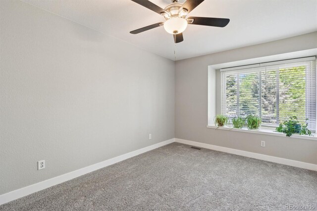 1462 Marigold Dr, Lafayette, CO 80026 - unfurnished room with baseboards, carpet flooring, and ceiling fan