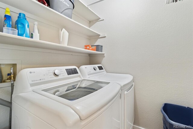 1462 Marigold Dr, Lafayette, CO 80026 - laundry area with washing machine and clothes dryer