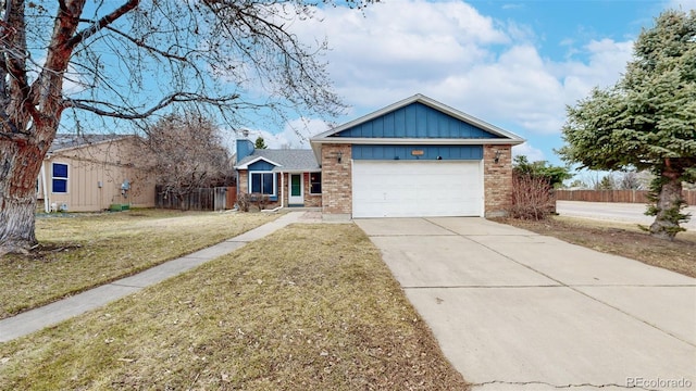 ranch-style house featuring driveway, a garage, a front lawn, board and batten siding, and brick siding