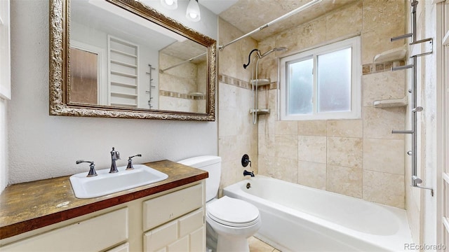 bathroom with  shower combination, vanity, and toilet