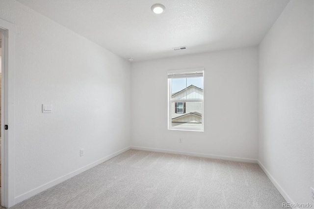 22363 E 6th Pl, Aurora, CO 80018 - unfurnished room featuring light colored carpet and baseboards