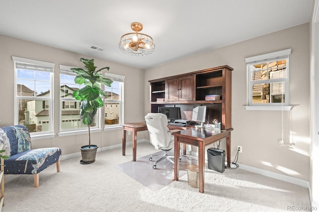 home office featuring a chandelier, visible vents, carpet flooring, and baseboards