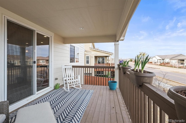 balcony featuring a residential view